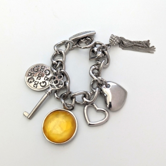 Guess Chain Bracelet Silver Tone, Amber, Key, Logo, Tassel Heart Dangle Pendants - Picture 1 of 8